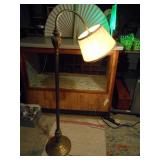 This is a Stiffel brass gooseneck floor lamp