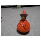 This image features a collection of various vintage and small toy figures