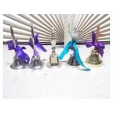 a collection of vintage-style collectible bell