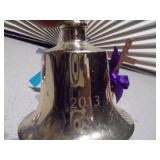 a collection of vintage-style collectible bell