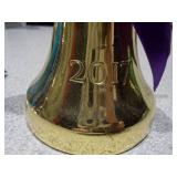 a collection of vintage-style collectible bell