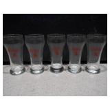 This image features a set of vintage Coors beer glasses from the 1970s