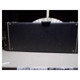 This item is a Rickenbacker hardshell guitar case,