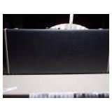 This item is a Rickenbacker hardshell guitar case,
