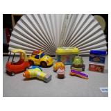 This image features a collection of assorted small plastic toys