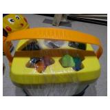 This image features a collection of assorted small plastic toys