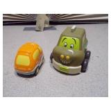 This image features a collection of assorted small plastic toys