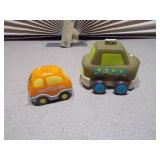 This image features a collection of assorted small plastic toys