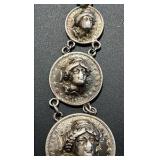 90% silver pendant made of a barber dime, quarter, and half dollar