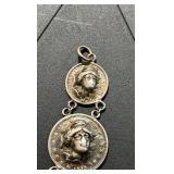 90% silver pendant made of a barber dime, quarter, and half dollar