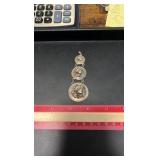90% silver pendant made of a barber dime, quarter, and half dollar
