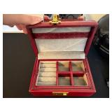 Red Jewelry Box, Round Vanity Mirror, Black Vase, Green Turtle Figurine