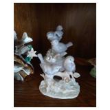 Top Shelf of Bird Figurines