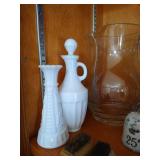 2 Shelves of Vases, Floral Frogs, Trivets, and Trays