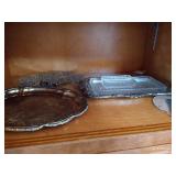 2 Shelves of Vases, Floral Frogs, Trivets, and Trays