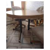 Table With (4) Upholstered Rolling Chairs and Leaf
