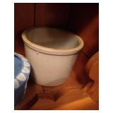 Bottom Shelf of Pottery