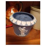 Bottom Shelf of Pottery