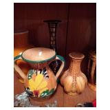 Bottom Shelf of Pottery