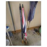 Hanging Rack with Tools, Metal Garbage Can, & Umbrellas