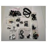 Collection of Black Gemstone and Glass Beads in Various Sizes and Shapes