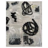 Large Collection of Black Gemstone Beads and Cabochons in Assorted Styles