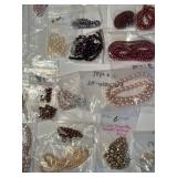 Large Collection of Assorted Loose Beads in Various Colors and Sizes