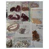Large Collection of Assorted Loose Beads in Various Colors and Sizes