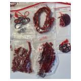 Collection of Red Glass, Stone, and Ceramic Beads Assorted Shapes and Sizes