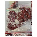 Collection of Red Glass, Stone, and Ceramic Beads Assorted Shapes and Sizes