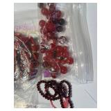 Collection of Red Glass, Stone, and Ceramic Beads Assorted Shapes and Sizes