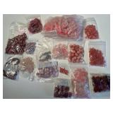 Collection of Assorted Pink and Red Gemstone Beads in Mixed Shapes and Sizes