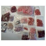Collection of Assorted Pink and Red Gemstone Beads in Mixed Shapes and Sizes