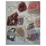 Collection of Assorted Pink and Red Gemstone Beads in Mixed Shapes and Sizes