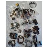 Assorted Collection of Semi-Precious Stone Beads and Bracelets in Various Shapes