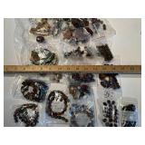 Assorted Collection of Semi-Precious Stone Beads and Bracelets in Various Shapes