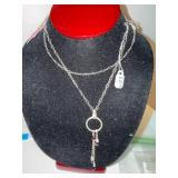 Sterling Silver Necklace with Garnet Accents and Circular Pendant