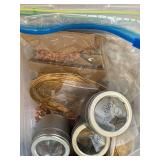 Collection of Gold-Filled Wire and Jewelry Findings in Storage Tins