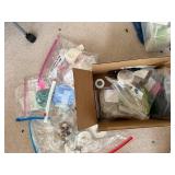 Collection of Gemstone Beads, Jewelry Findings, and Crafting Supplies in Bags and Box