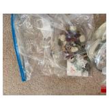 Collection of Gemstone Beads, Jewelry Findings, and Crafting Supplies in Bags and Box