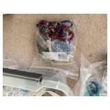 Large Collection of Assorted Beads and Strands in Plastic Storage Bin