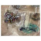 Large Collection of Assorted Beads and Strands in Plastic Storage Bin