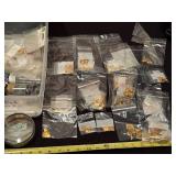 Large Assortment of Themed Gold Tone Metal Charms in Bags