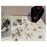 Collection of Artisan Jewelry Including Necklaces, Earrings, and Bracelets