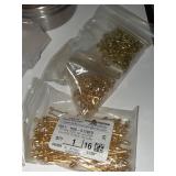 Collection of Copper and Bronze Jewelry Findings and Pendants in Organizing Containers