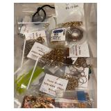 Collection of Copper and Bronze Jewelry Findings and Pendants in Organizing Containers