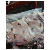 Collection of Assorted Fabric Remnants and Fat Quarters with Patterns