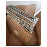 Collection of Vintage Vinyl Records, Cassette Tapes, and Music VHS