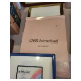 Large Collection of Photo Frames, Albums, Display Cases, and Wall Racks