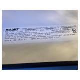 Sharp 24 in. 1.2 cu. ft. Built-In Microwave Drawer with Concealed Controls in Stainless Steel Finish with Sensor Cooking Model # SMD2470ASYG